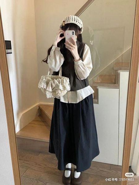 Sức hấp dẫn chân váy xếp ly dài